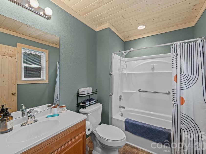 588 Panoramic Loop, Maggie Valley, NC 28751.  MLS# CAR4431380, YatesRealty ID 56124. Ensuite bath on main level