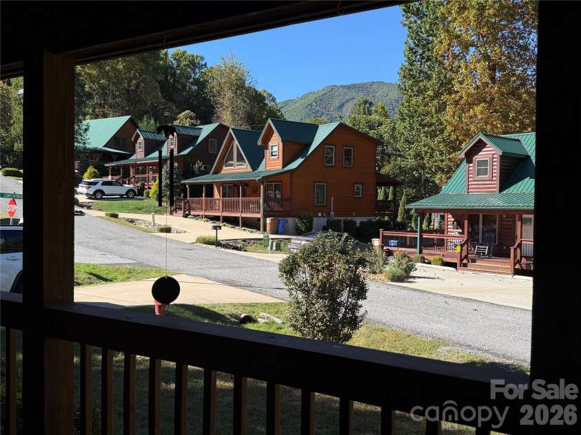 588 Panoramic Loop, Maggie Valley, NC 28751.  MLS# CAR4431380, YatesRealty ID 56124. View from front porch