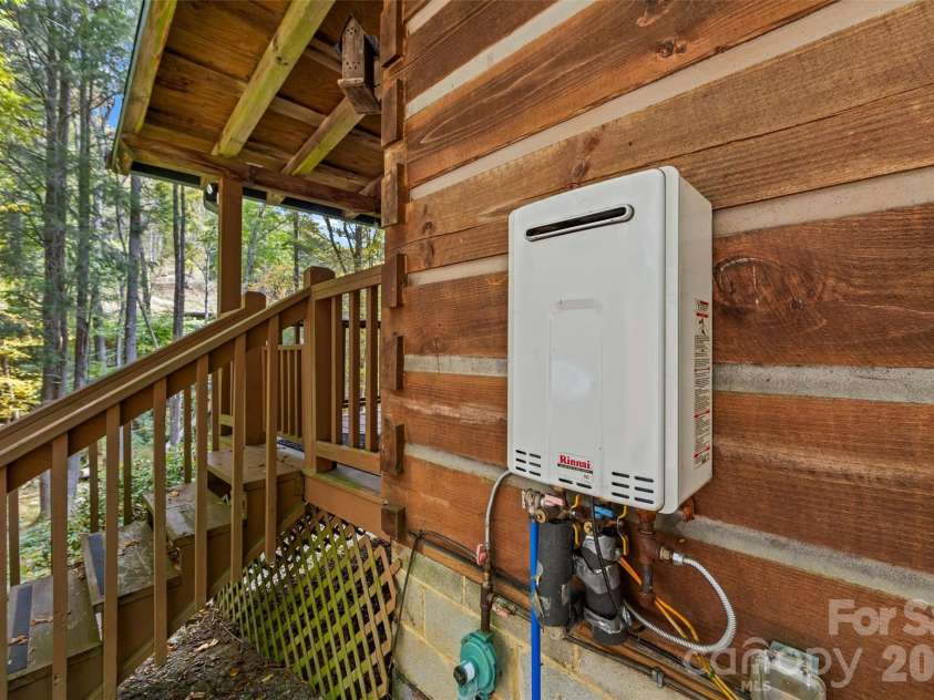 758 Mashstomp Road, Maggie Valley, NC 28751.  MLS# CAR4433434, YatesRealty ID 56129. Instant Hot Water heater