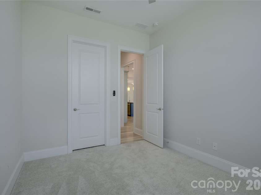 82105 Standing Oak Drive, Charlotte, NC 28278.  MLS# CAR4410343, YatesRealty ID 56131. Guest suite 2