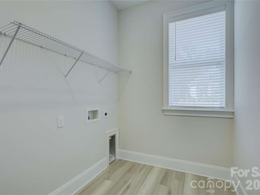 82105 Standing Oak Drive, Charlotte, NC 28278.  MLS# CAR4410343, YatesRealty ID 56131. Laundry room