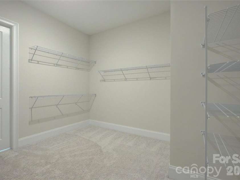 82105 Standing Oak Drive, Charlotte, NC 28278.  MLS# CAR4410343, YatesRealty ID 56131. Oversized primary closet
