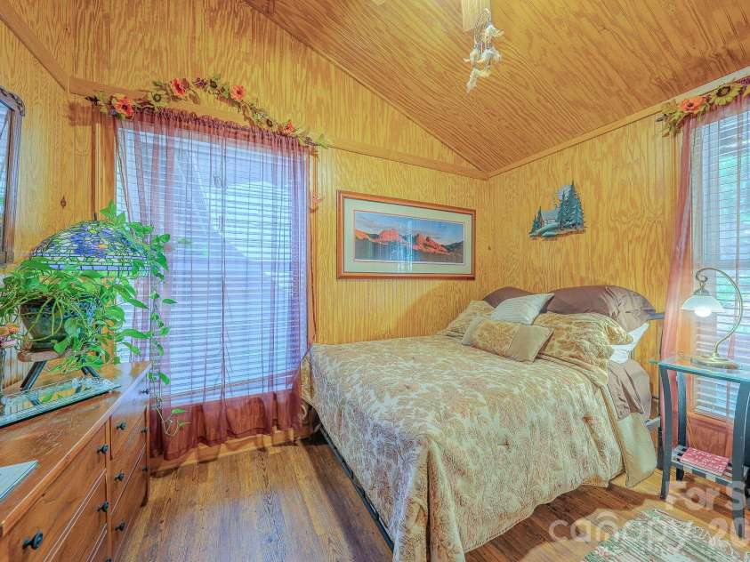 54 Winning Way, Old Fort, NC 28762.  MLS# CAR4433499, YatesRealty ID 56132. Bedrooms offer vaulted ceilings and big windows.