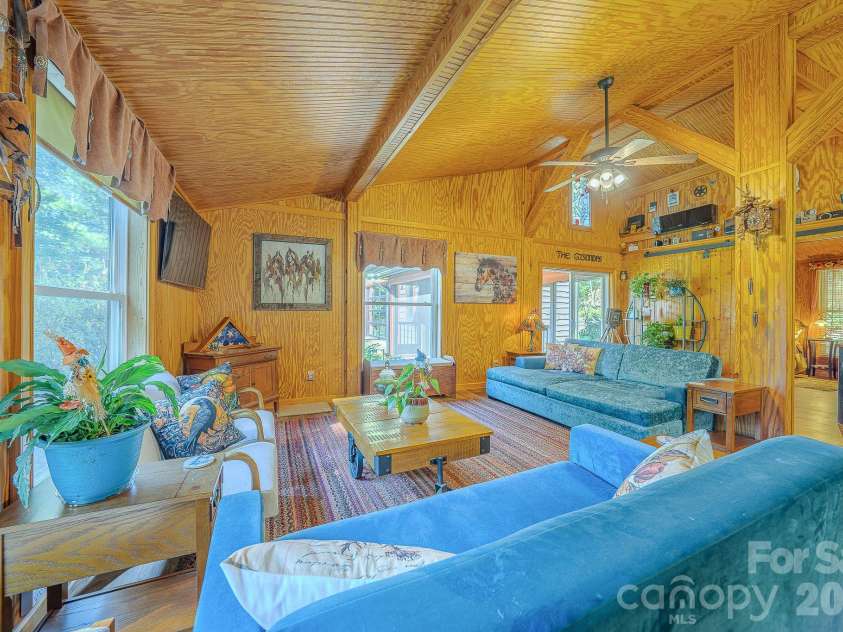 54 Winning Way, Old Fort, NC 28762.  MLS# CAR4433499, YatesRealty ID 56132. Great room filled with natural light.