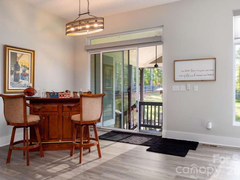 295 Rhode Island Court, Mocksville, NC 27028.  MLS# CAR4433632, YatesRealty ID 56133. Versatile area for either a dining room table or bar area!