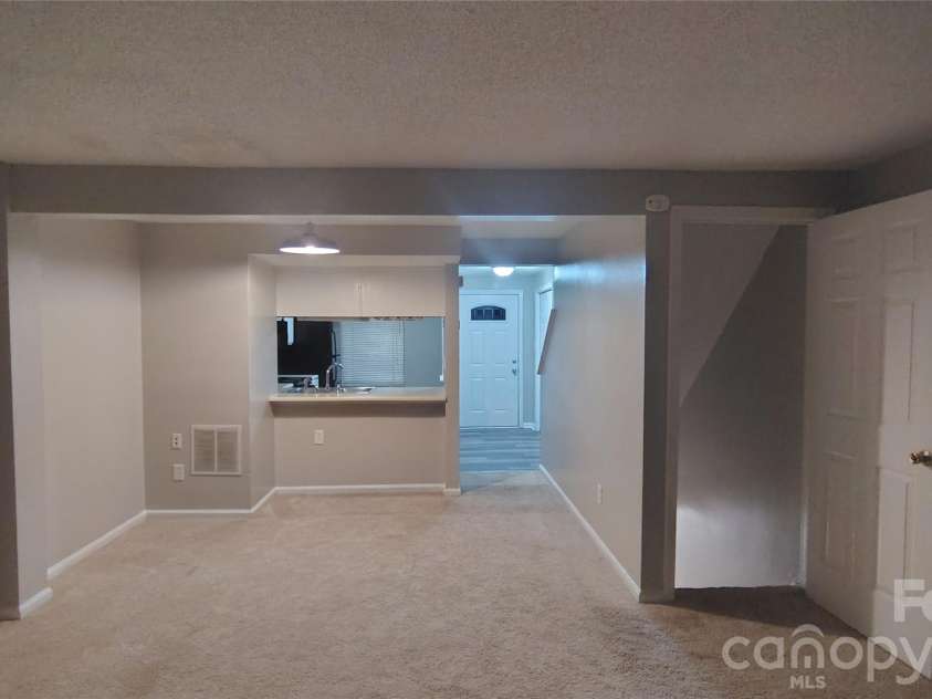 9624 Vinca Circle, Charlotte, NC 28213.  MLS# CAR4433625, YatesRealty ID 56140. Dining and Living Room