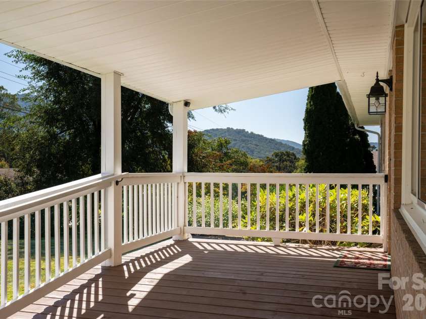 23 Wagon Road, Asheville, NC 28805.  MLS# CAR4433156, YatesRealty ID 56141. Front covered porch