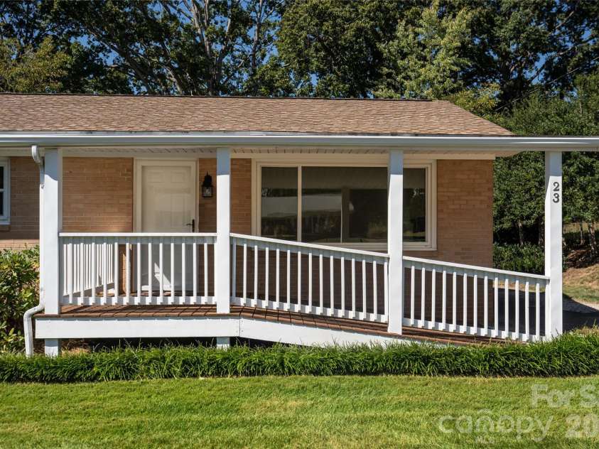 23 Wagon Road, Asheville, NC 28805.  MLS# CAR4433156, YatesRealty ID 56141. Front porch
