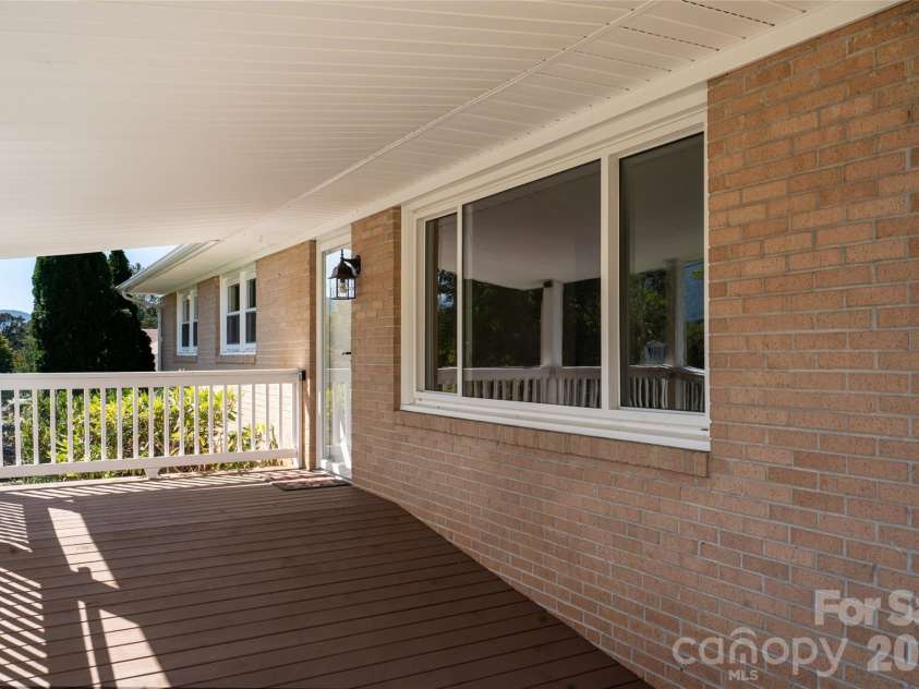 23 Wagon Road, Asheville, NC 28805.  MLS# CAR4433156, YatesRealty ID 56141. Front porch