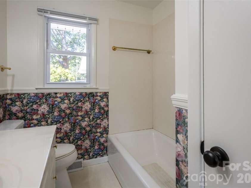 23 Wagon Road, Asheville, NC 28805.  MLS# CAR4433156, YatesRealty ID 56141. Guest bathroom