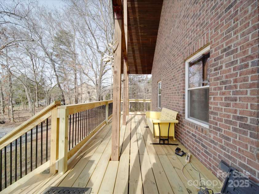 5687 Putuptoe Place, Norwood, NC 28128.  MLS# CAR4233890, YatesRealty ID 5617. Covered Front Porch