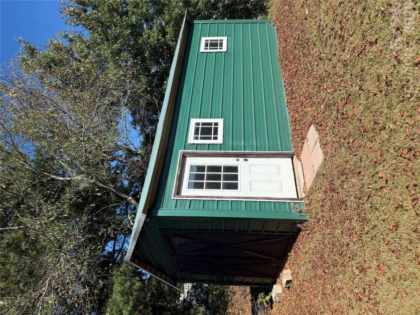 97 Fair Haven Drive, Burnsville, NC 28714.  MLS# CAR4433104, YatesRealty ID 56186. 12 x 20 shed for extra storage