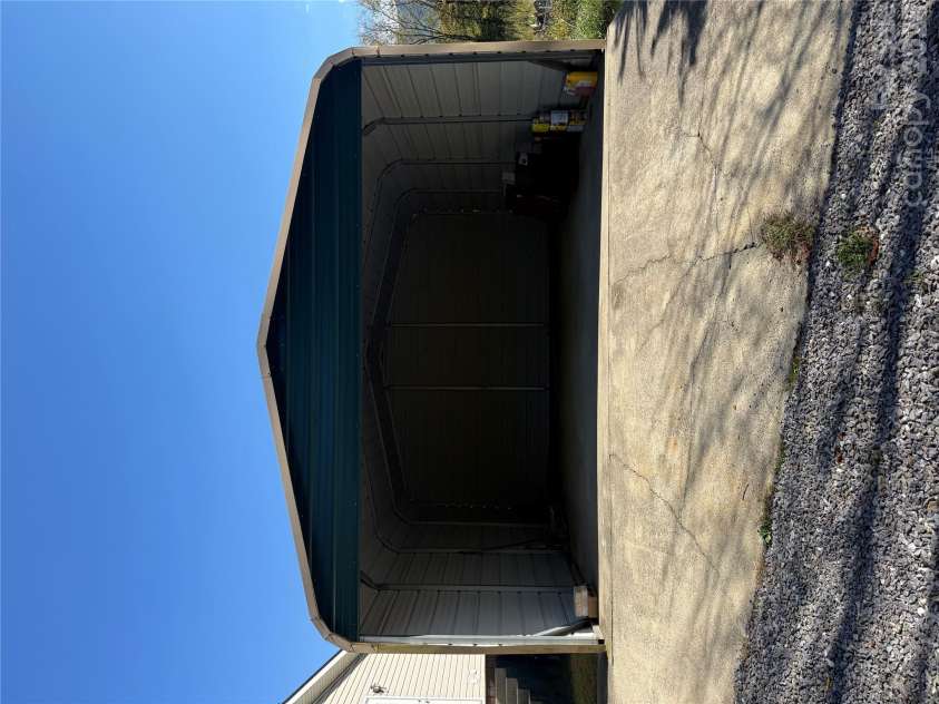 97 Fair Haven Drive, Burnsville, NC 28714.  MLS# CAR4433104, YatesRealty ID 56186. 2 car carport
