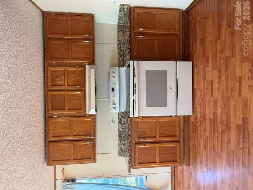 97 Fair Haven Drive, Burnsville, NC 28714.  MLS# CAR4433104, YatesRealty ID 56186. Granite counters