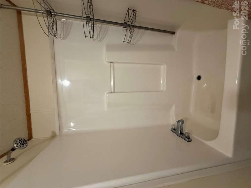 97 Fair Haven Drive, Burnsville, NC 28714.  MLS# CAR4433104, YatesRealty ID 56186. Guest bath