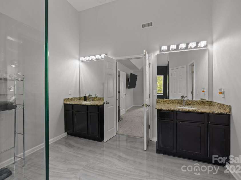 8453 Mossy Cup Trail, Harrisburg, NC 28075.  MLS# CAR4245368, YatesRealty ID 5619. Beautiful dual vanities