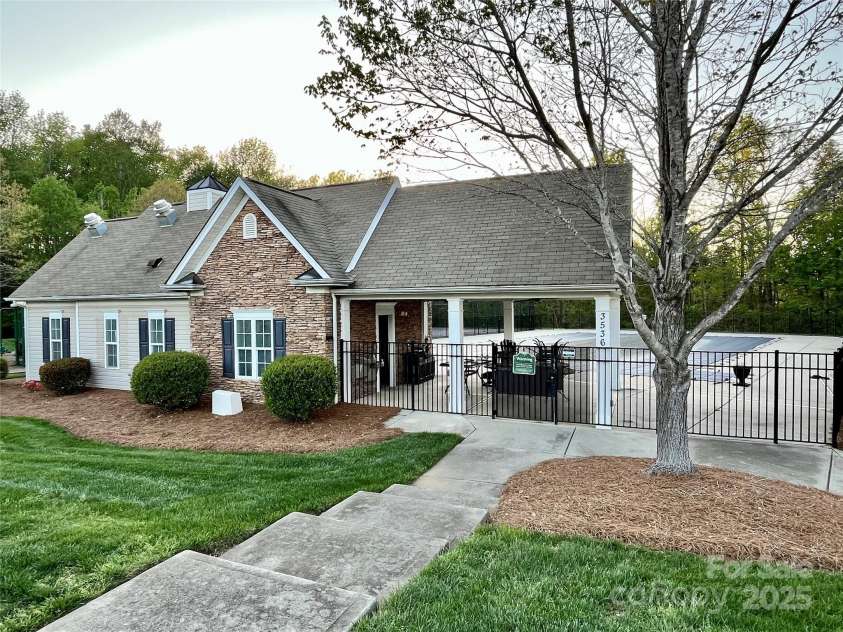 8453 Mossy Cup Trail, Harrisburg, NC 28075.  MLS# CAR4245368, YatesRealty ID 5619. Clubhouse and pool