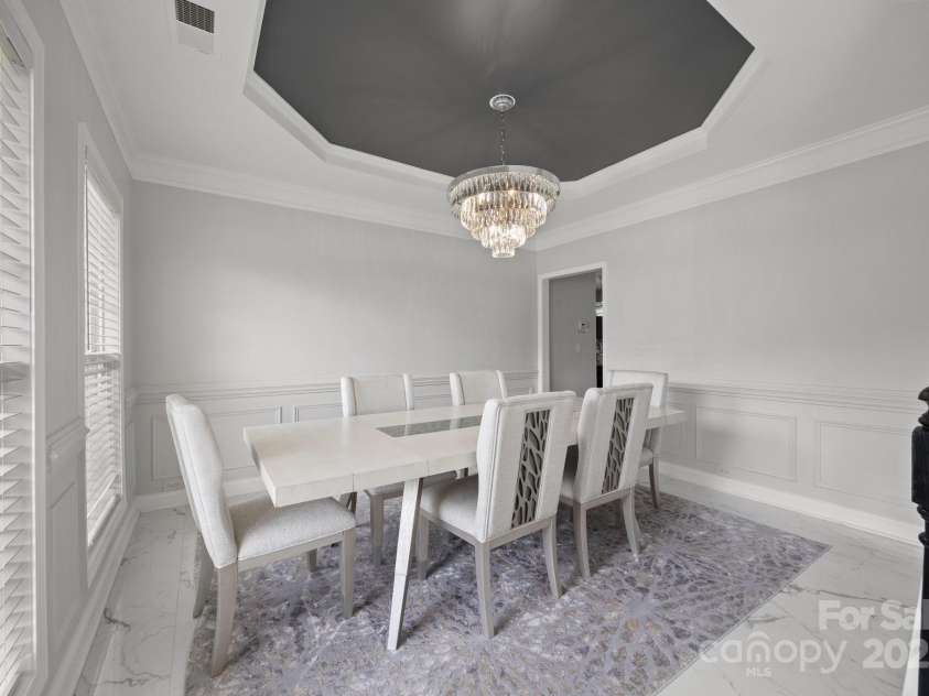 8453 Mossy Cup Trail, Harrisburg, NC 28075.  MLS# CAR4245368, YatesRealty ID 5619. Dining room off of foyer and kitchen