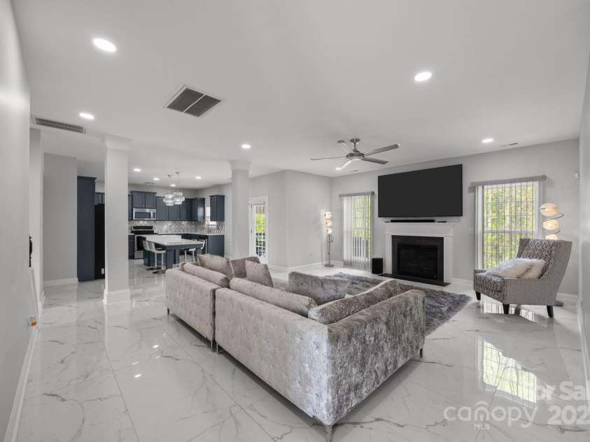 8453 Mossy Cup Trail, Harrisburg, NC 28075.  MLS# CAR4245368, YatesRealty ID 5619. Open concept leads into custom kitchen