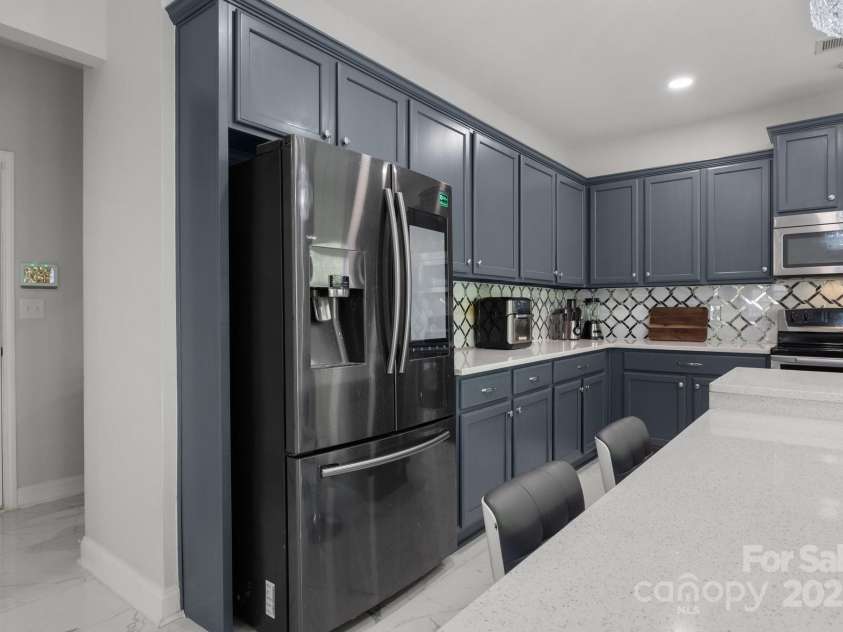 8453 Mossy Cup Trail, Harrisburg, NC 28075.  MLS# CAR4245368, YatesRealty ID 5619. Smart fridge conveys with appropriate offer