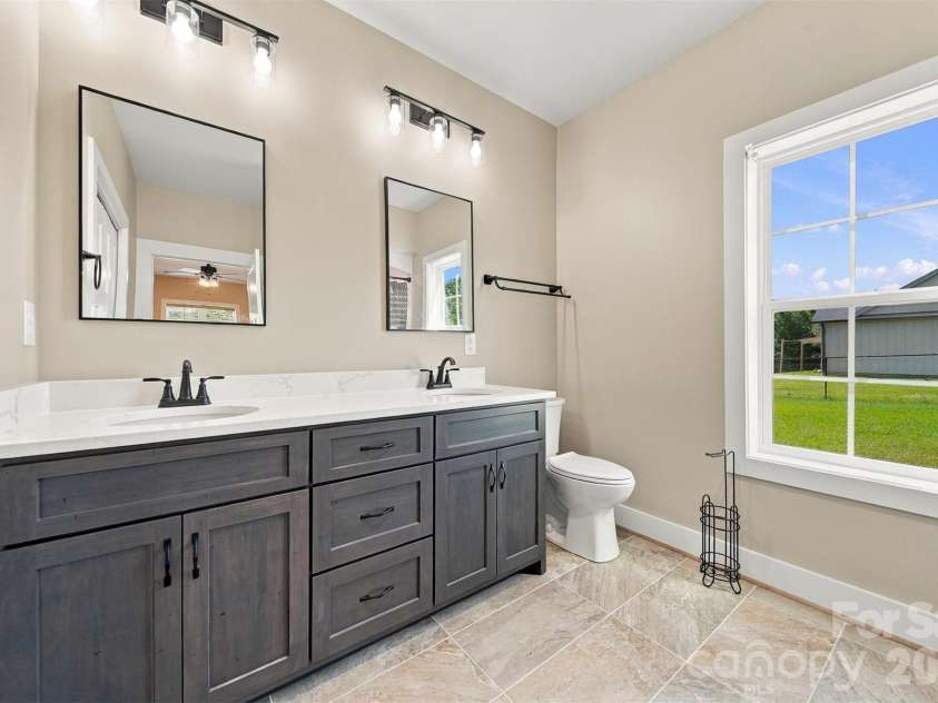 2937 Frank Whisnant Road, Morganton, NC 28655.  MLS# CAR4432522, YatesRealty ID 56195. Primary bath double vanity