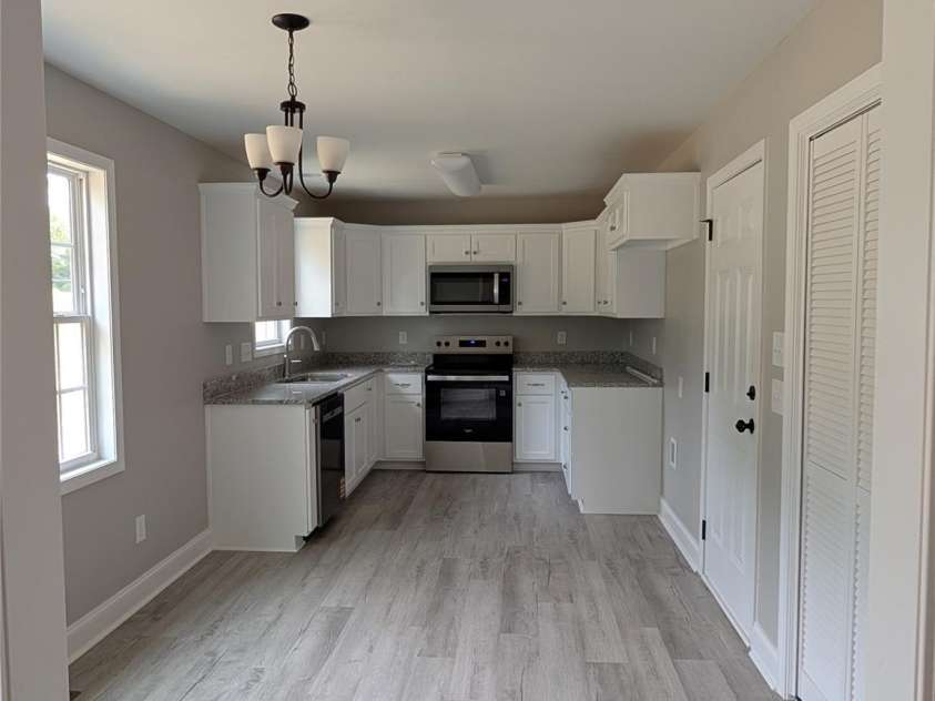 2746 Magnolia Street, Conover, NC 28613.  MLS# CAR4433256, YatesRealty ID 56196. Kitchen from Great Room