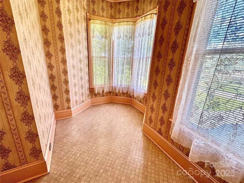 4689 Lakeview Acres Road, Valdese, NC 28690.  MLS# CAR4260635, YatesRealty ID 562. 1st upstairs bedroom with turret