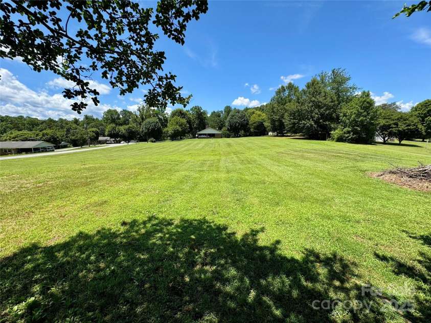 4689 Lakeview Acres Road, Valdese, NC 28690.  MLS# CAR4260635, YatesRealty ID 562. Huge side yard. Room for football.