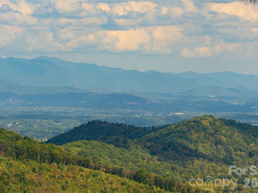 342 Doubletop Lane, Candler, NC 28715.  MLS# CAR4432482, YatesRealty ID 56204. 