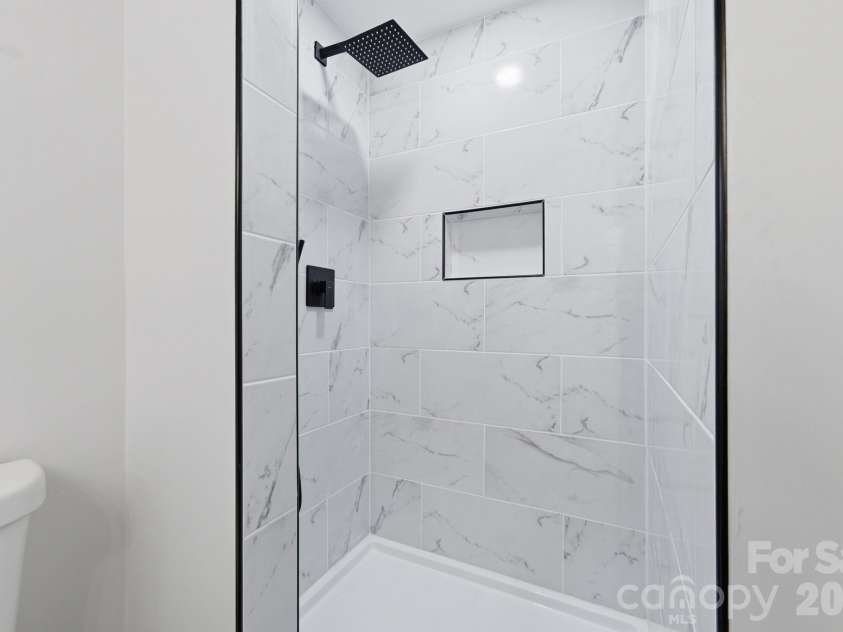 214 Dalewood Avenue, Kannapolis, NC 28083.  MLS# CAR4430178, YatesRealty ID 56219. Tiled Primary Shower