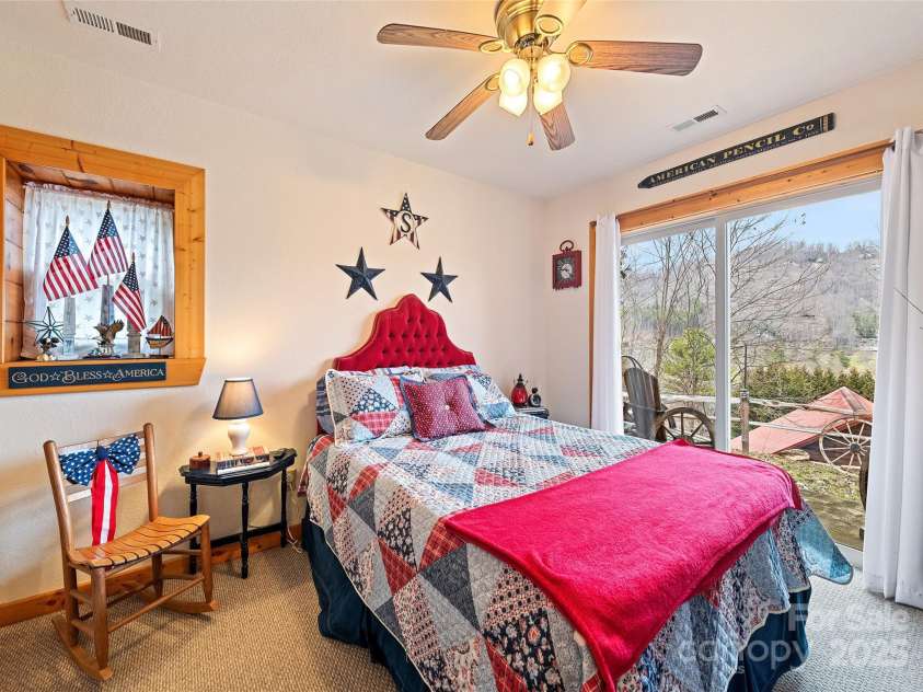 16 Hiawatha Drive, Maggie Valley, NC 28751.  MLS# CAR4331978, YatesRealty ID 5622. Lower-level Secondary Bedroom