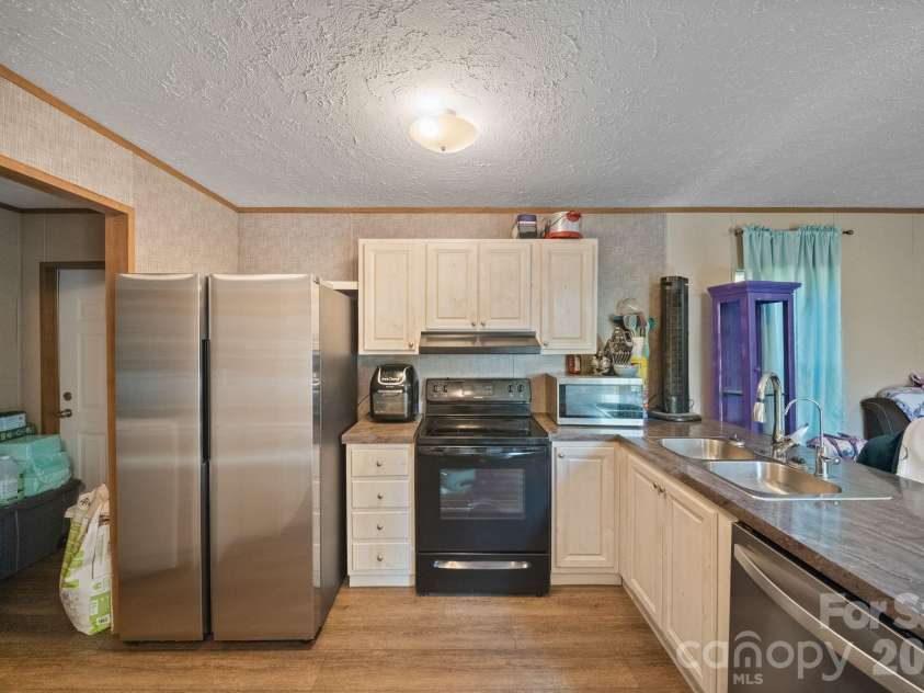57 Willis Road, Asheville, NC 28806.  MLS# CAR4432980, YatesRealty ID 56225. 