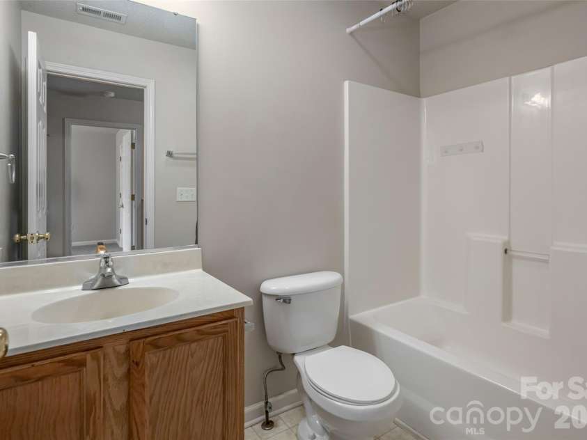 201 Birch Lane, Arden, NC 28704.  MLS# CAR4386730, YatesRealty ID 56230. Guest bathroom in Upper Level
