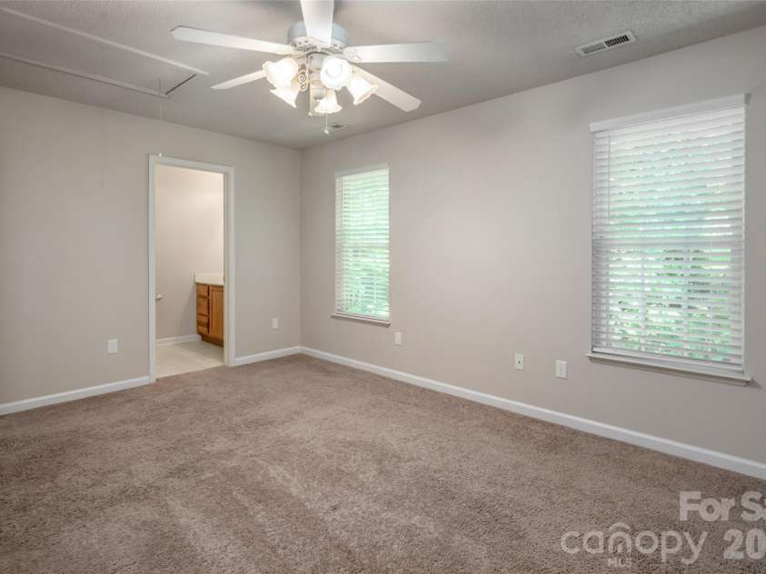 201 Birch Lane, Arden, NC 28704.  MLS# CAR4386730, YatesRealty ID 56230. Primary bedroom with en-suite bathroom
