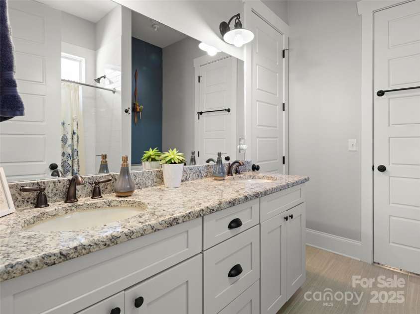 32 Bungalow Way, Brevard, NC 28712.  MLS# CAR4330127, YatesRealty ID 5624. Guest bath 2