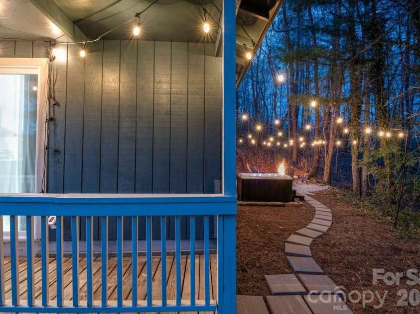 36 Collins Mountain Drive, Asheville, NC 28804.  MLS# CAR4433286, YatesRealty ID 56242. Path behind home