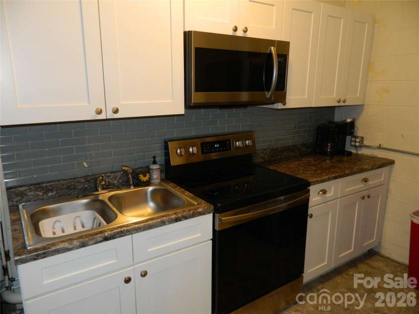4307 Partridge Court, Lenoir, NC 28645.  MLS# CAR4433483, YatesRealty ID 56245. Lower Level Kitchen