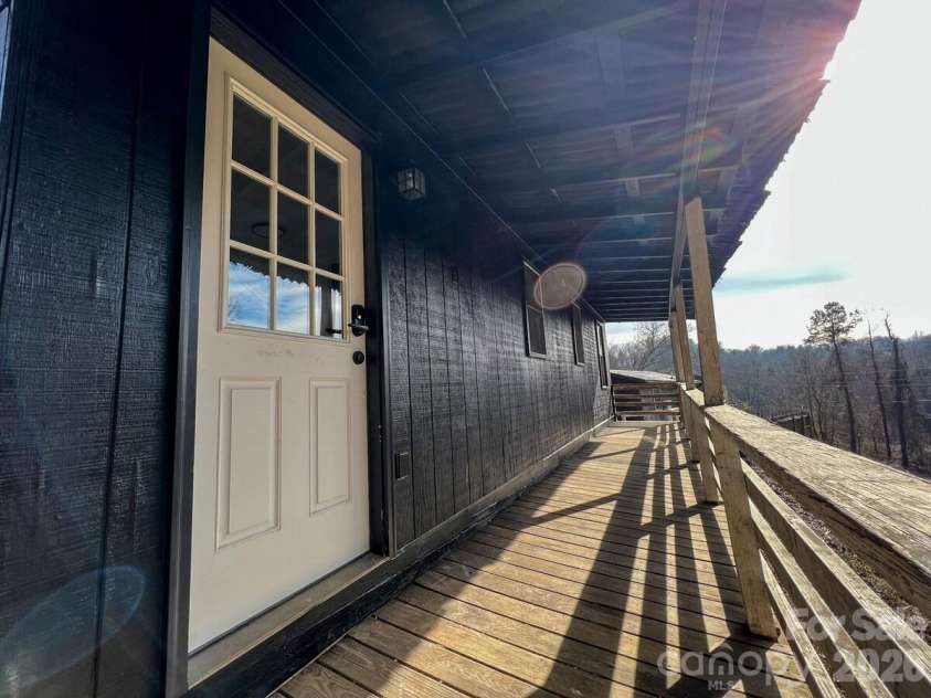 28 Collins Mountain Drive, Asheville, NC 28804.  MLS# CAR4433152, YatesRealty ID 56246. Front Porch