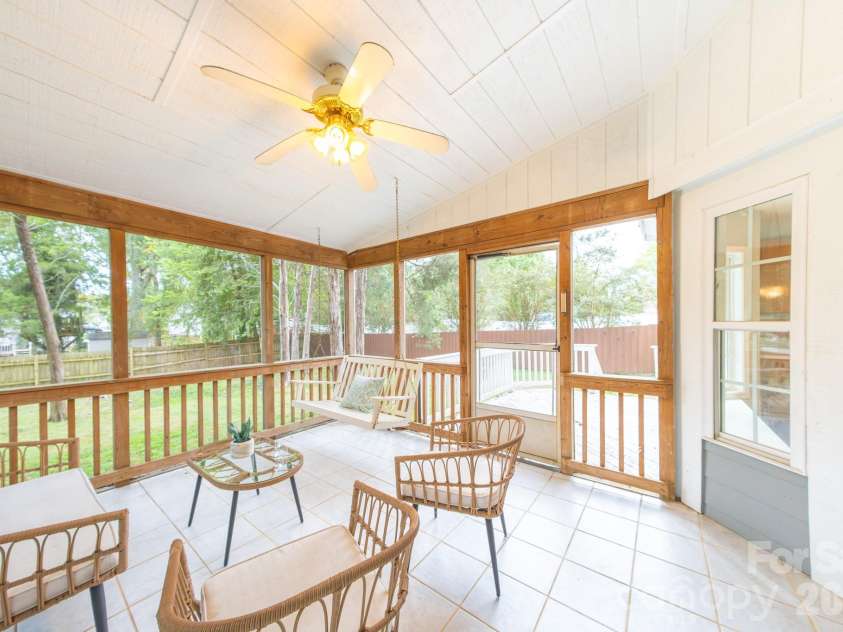 13836 Poppleton Court, Charlotte, NC 28273.  MLS# CAR4433885, YatesRealty ID 56253. Screened in sunroom at back overlooking your private back yard