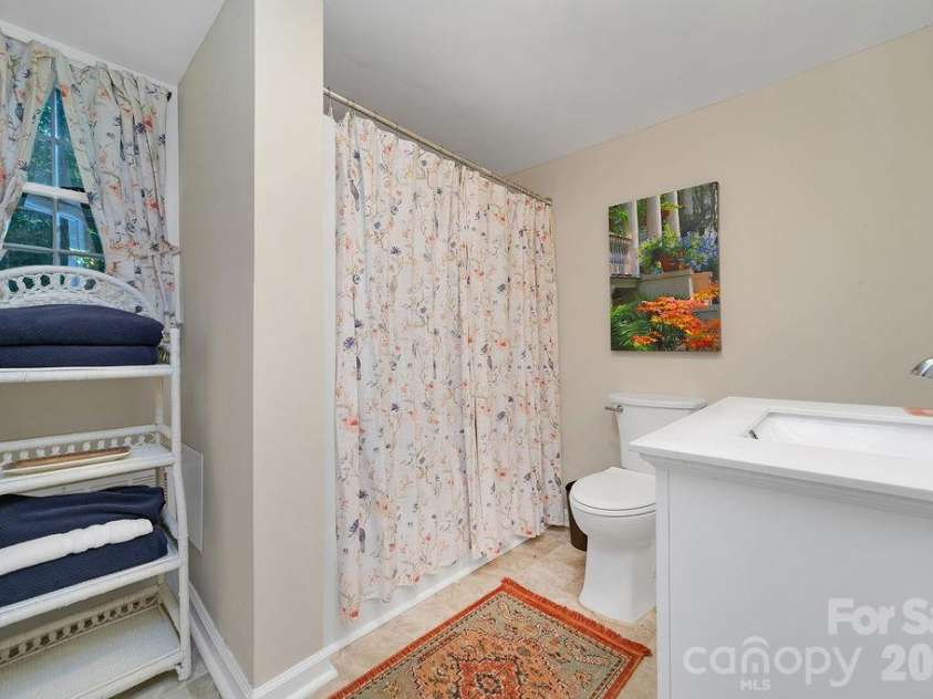 2377 Connestee Trail, Brevard, NC 28712.  MLS# CAR4431214, YatesRealty ID 56257. Lower Level Bath