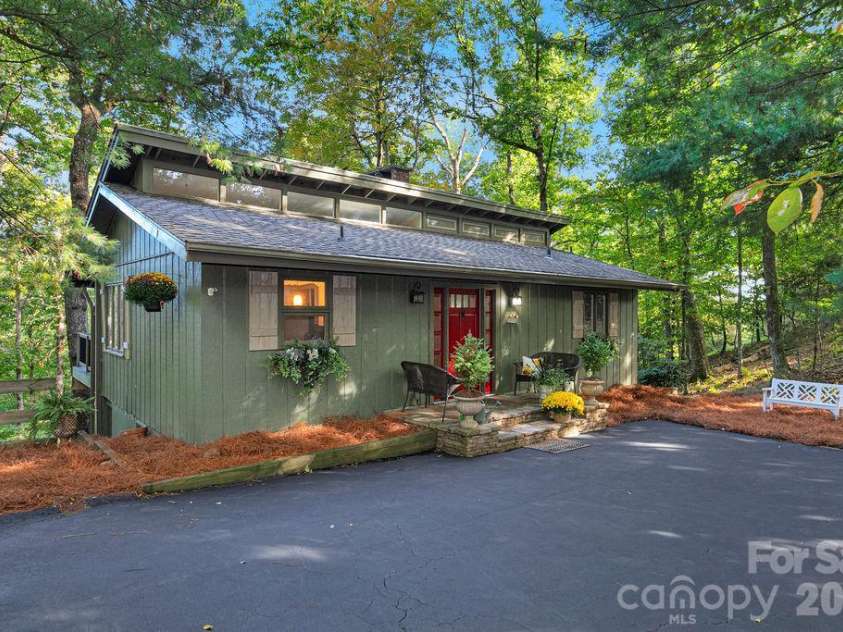 2377 Connestee Trail, Brevard, NC 28712.  MLS# CAR4431214, YatesRealty ID 56257. Pristine Cottage in the Woods