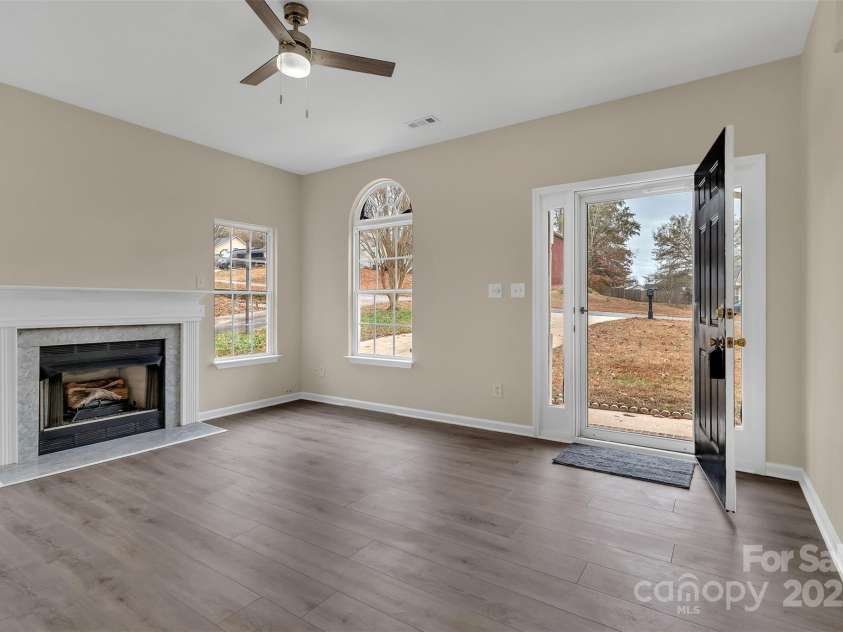1331 Copper Creek Lane, Fort Mill, SC 29715.  MLS# CAR4326414, YatesRealty ID 5626. Entrance into living area with gas fireplace for chilly nights!