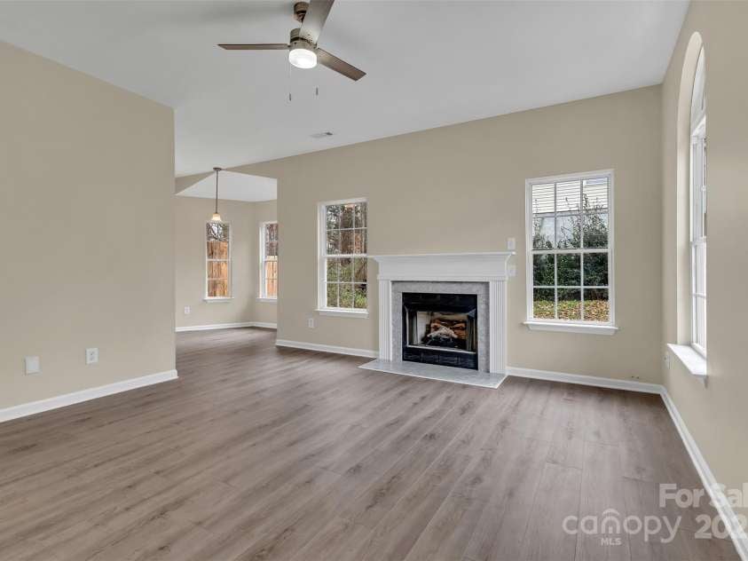 1331 Copper Creek Lane, Fort Mill, SC 29715.  MLS# CAR4326414, YatesRealty ID 5626. View of living room from entrance! Natural light floods the space!