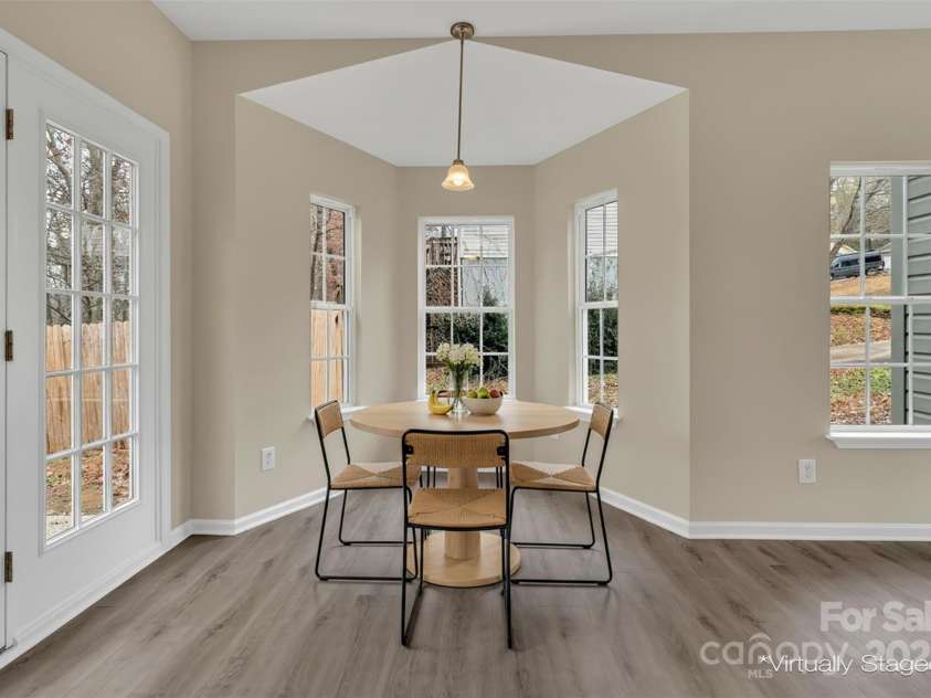 1331 Copper Creek Lane, Fort Mill, SC 29715.  MLS# CAR4326414, YatesRealty ID 5626. Virtually staged dining area with new Pendant lighting for ambiance!