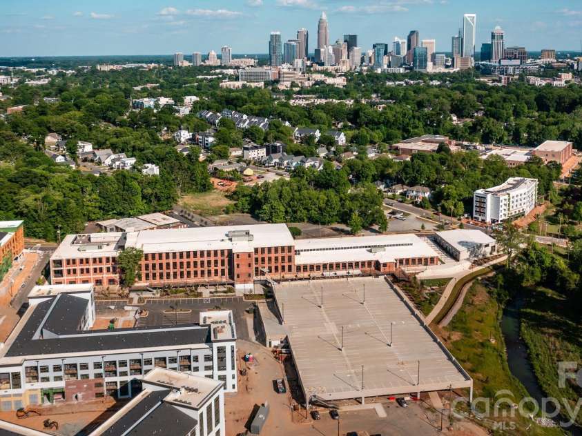 412 State Street, Charlotte, NC 28208.  MLS# CAR4273285, YatesRealty ID 5626. Savona Mill - massive adaptive use project just steps away featuring office, retail & apartments.