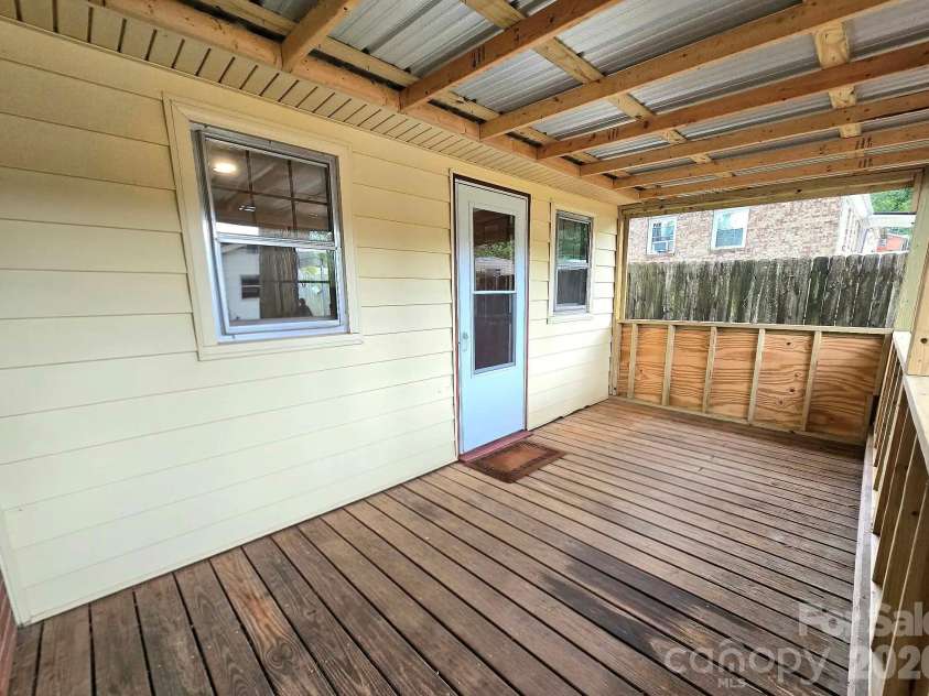 4107 Windwood Drive, Gastonia, NC 28056.  MLS# CAR4433892, YatesRealty ID 56264. Covered Back Deck with direct entrance into the Flex Space