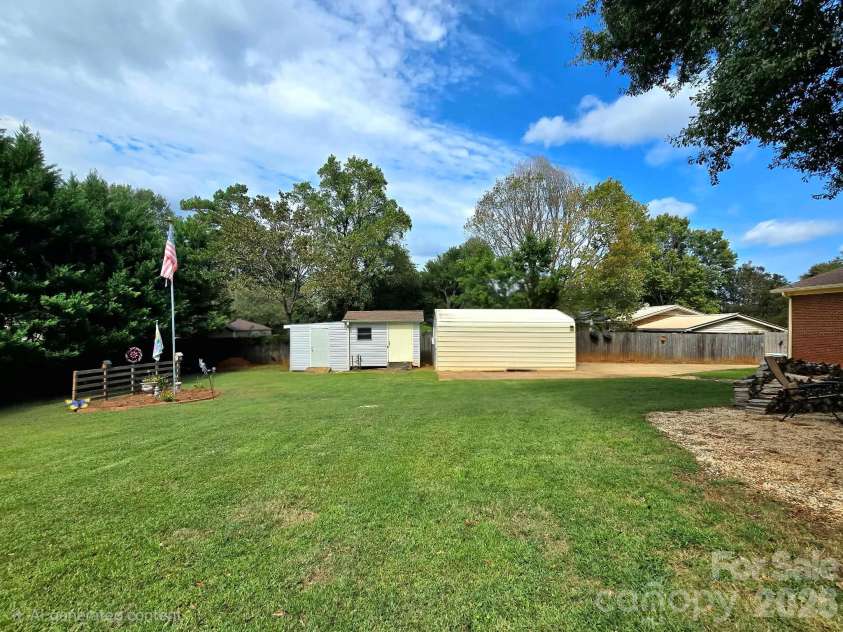 4107 Windwood Drive, Gastonia, NC 28056.  MLS# CAR4433892, YatesRealty ID 56264. Detached 1 car garage/work shop as well as 2 additional storage units