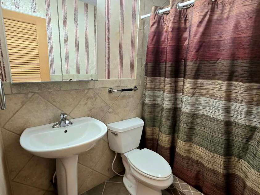 4107 Windwood Drive, Gastonia, NC 28056.  MLS# CAR4433892, YatesRealty ID 56264. Full bath with walk-in shower