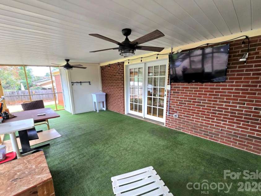 4107 Windwood Drive, Gastonia, NC 28056.  MLS# CAR4433892, YatesRealty ID 56264. Screened in covered back Deck with direct entrance into the kitchen