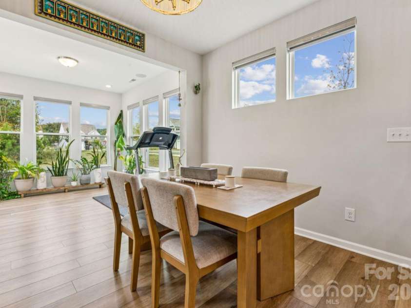 8704 Frank Grier Road, Charlotte, NC 28215.  MLS# CAR4433413, YatesRealty ID 56267. Breakfast nook into sunroom
